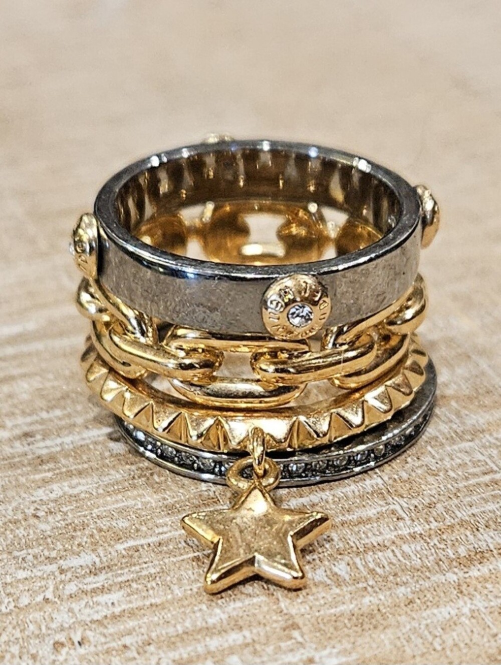 Henry Bendel. Mixed Metal Stackable Rings with Gold Star Charm - Gold and Silver